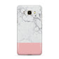 Marble White Carrara Pink Samsung Galaxy J7 2016 Case on gold phone