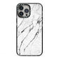Marble White iPhone 13 Pro Max Black Impact Case on Silver phone