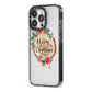 Merry Christmas Log Floral iPhone 13 Pro Black Impact Case Side Angle on Silver phone