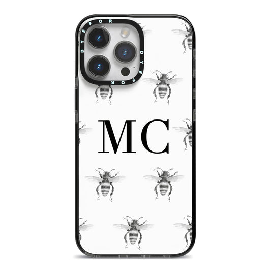 Monochrome Bees with Monogram iPhone 14 Pro Max Black Impact Case on Silver phone