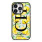 Monogrammed Lemon Fruit iPhone 14 Pro Black Impact Case on Silver phone