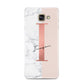 Monogrammed Rose Gold Marble Samsung Galaxy A3 2016 Case on gold phone