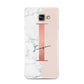 Monogrammed Rose Gold Marble Samsung Galaxy A3 2016 Case on gold phone