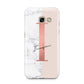 Monogrammed Rose Gold Marble Samsung Galaxy A3 2017 Case on gold phone