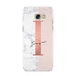Monogrammed Rose Gold Marble Samsung Galaxy A5 2017 Case on gold phone