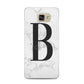 Monogrammed White Marble Samsung Galaxy A5 2016 Case on gold phone