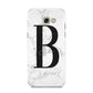 Monogrammed White Marble Samsung Galaxy A5 2017 Case on gold phone