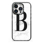 Monogrammed White Marble iPhone 14 Pro Black Impact Case on Silver phone