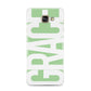 Pale Green with Bold White Text Samsung Galaxy A3 2016 Case on gold phone