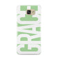 Pale Green with Bold White Text Samsung Galaxy A9 2016 Case on gold phone
