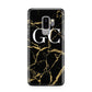 Personalised Gold Black Marble Monogram Samsung Galaxy S9 Plus Case on Silver phone