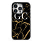Personalised Gold Black Marble Monogram iPhone 14 Pro Black Impact Case on Silver phone