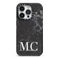 Personalised Monogram Black Marble iPhone 14 Pro Black Impact Case on Silver phone