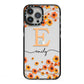 Personalised Orange Flowers iPhone 13 Pro Max Black Impact Case on Silver phone