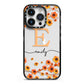 Personalised Orange Flowers iPhone 14 Pro Black Impact Case on Silver phone