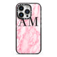 Personalised Pink Marble Monogrammed iPhone 14 Pro Black Impact Case on Silver phone