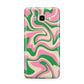 Pink And Green Swirl Samsung Galaxy J7 2016 Case on gold phone