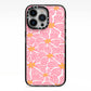 Pink Flowers iPhone 13 Pro Black Impact Case on Silver phone