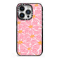 Pink Flowers iPhone 14 Pro Black Impact Case on Silver phone