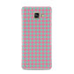 Pink Houndstooth Samsung Galaxy A3 2016 Case on gold phone
