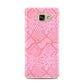 Pink Snakeskin Samsung Galaxy A7 2016 Case on gold phone