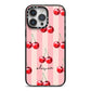 Pink Stripes with Cherries and Text iPhone 14 Pro Max Black Impact Case on Silver phone