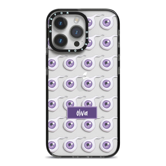 Purple Eyeballs Custom Halloween iPhone 14 Pro Max Black Impact Case on Silver phone