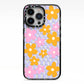 Retro Check Floral iPhone 13 Pro Black Impact Case on Silver phone