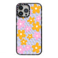 Retro Check Floral iPhone 13 Pro Max Black Impact Case on Silver phone