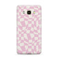 Retro Pink Check Samsung Galaxy J7 2016 Case on gold phone