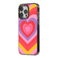 Seventies Heart iPhone 14 Pro Max Black Impact Case Side Angle on Silver phone
