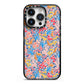 Small Flowers iPhone 14 Pro Black Impact Case on Silver phone