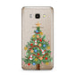Sparkling Christmas Tree Samsung Galaxy J7 2016 Case on gold phone