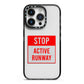 Stop Active Runway iPhone 14 Pro Black Impact Case on Silver phone