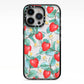 Strawberry Plant iPhone 13 Pro Black Impact Case on Silver phone