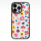 Summer Floral iPhone 13 Pro Black Impact Case on Silver phone