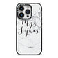 Surname Personalised Marble iPhone 14 Pro Black Impact Case on Silver phone