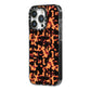 Tortoise Shell Pattern iPhone 14 Pro Black Impact Case Side Angle on Silver phone