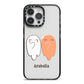 Two Ghosts iPhone 14 Pro Max Black Impact Case on Silver phone