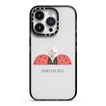 Two Ladybirds iPhone 14 Pro Black Impact Case on Silver phone