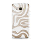 White Swirl Samsung Galaxy J7 2016 Case on gold phone