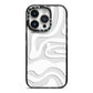 White Swirl iPhone 14 Pro Black Impact Case on Silver phone