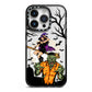Witch Meets Zombie iPhone 14 Pro Black Impact Case on Silver phone
