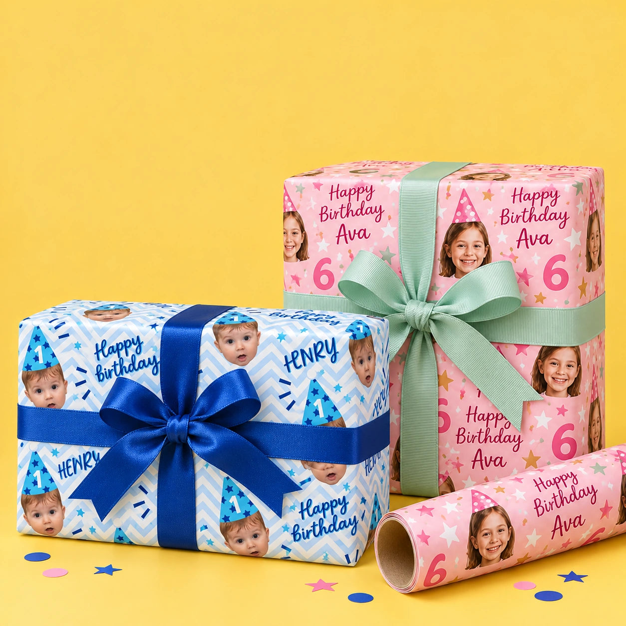 Pink and blue personalised birthday wrapping paper gifts with mint and cobalt bows on a yellow studio background